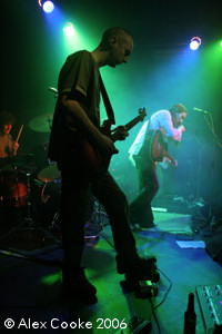 Photo of Carlos on stage with Static Rain