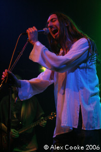 Photo of Chris on stage with Static Rain