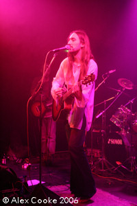 Photo of Chris on stage with Static Rain